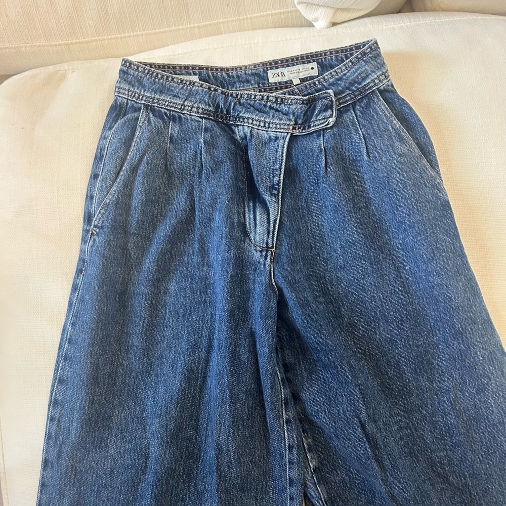 Zara dark wash denim jeans.